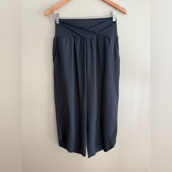 HALARA Black Cropped Pants with an Asymmetrical Bottom and Crisscross Front - Picture 3 of 17